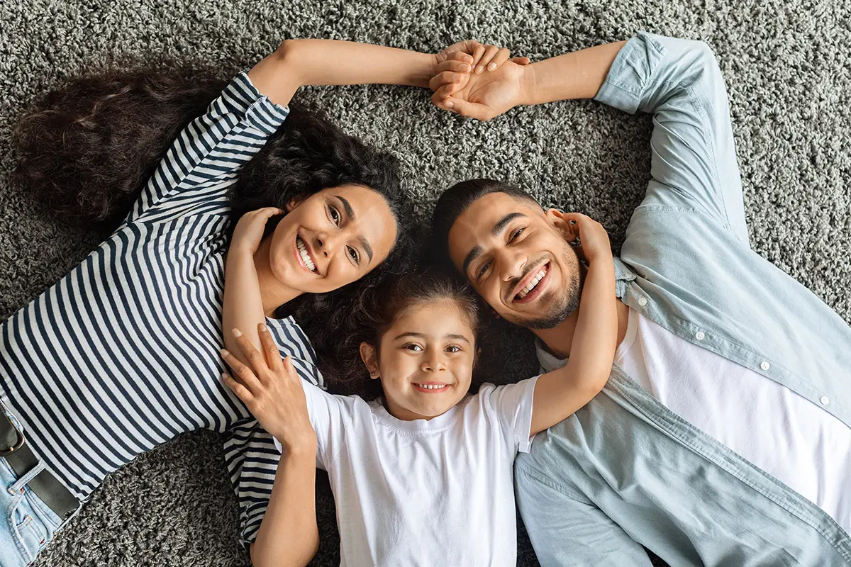 family on carpet
