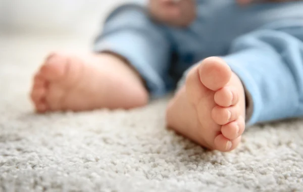 Toddler on carpet